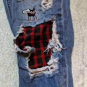 Patched ripped jeans